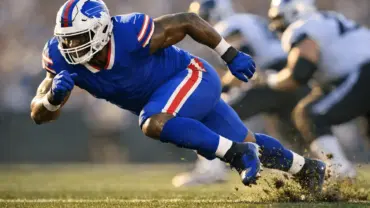 Buffalo Bills edge rusher explosively rushing off the line during an NFL game