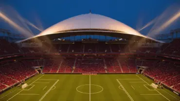 BC Place stadium in Vancouver illuminated at dusk before Canada vs Qatar World Cup match