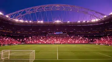 BC Place Stadium illuminated at night with Canadian fans for World Cup soccer match in Vancouver