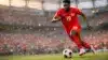 Alphonso Davies sprinting with ball for Canada at BC Place Stadium during 2026 World Cup