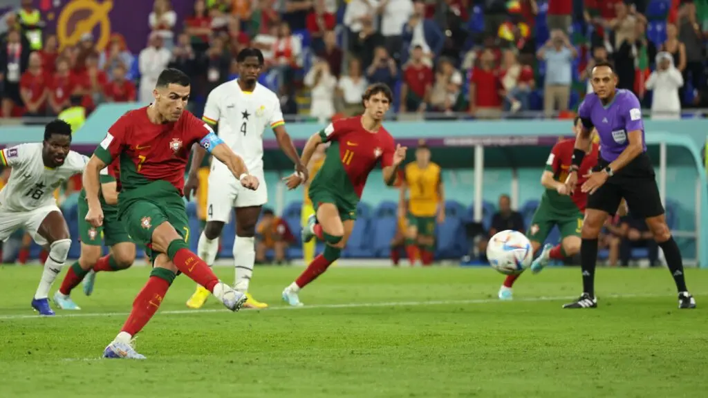 Cristiano Ronaldo taking a penalty kick for Portugal in a World Cup match.
