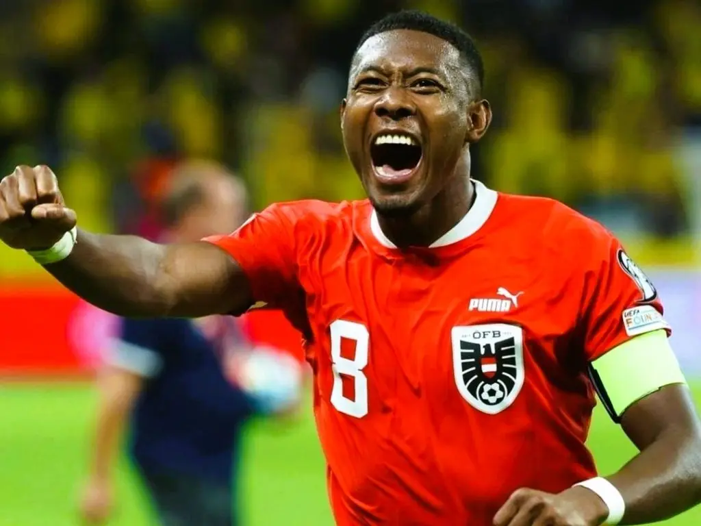 David Alaba celebrating in Austria national team jersey during a match.