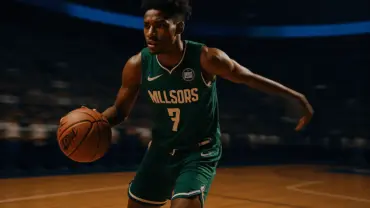 NBA player in Bucks jersey driving to basket suggesting trade scenario between Milwaukee and Detroit