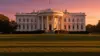 The White House South Portico at sunset with manicured lawn in foreground