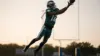 Eagles wide receiver making leaping catch during training camp practice