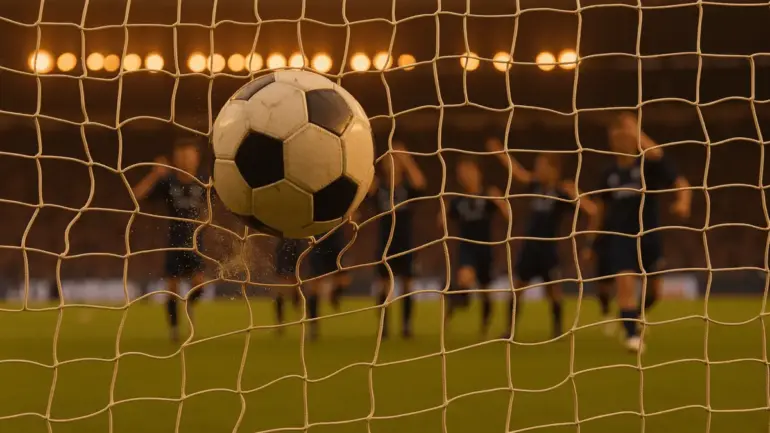 Soccer ball hitting back of net with France players celebrating World Cup goal