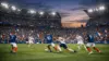 France national soccer team playing international match in packed stadium under floodlights