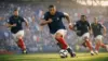 French national team in action during 2026 World Cup match in blue kit with dynamic stadium atmosphere