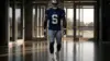 NFL wide receiver arriving at Dallas Cowboys training facility for mandatory minicamp