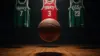 Basketball suspended in arena with team jerseys representing Giannis Antetokounmpo trade talks