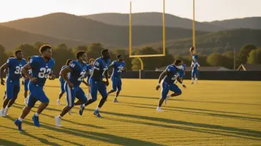 New York Giants receivers running routes during minicamp practice with kicker and training facility backdrop