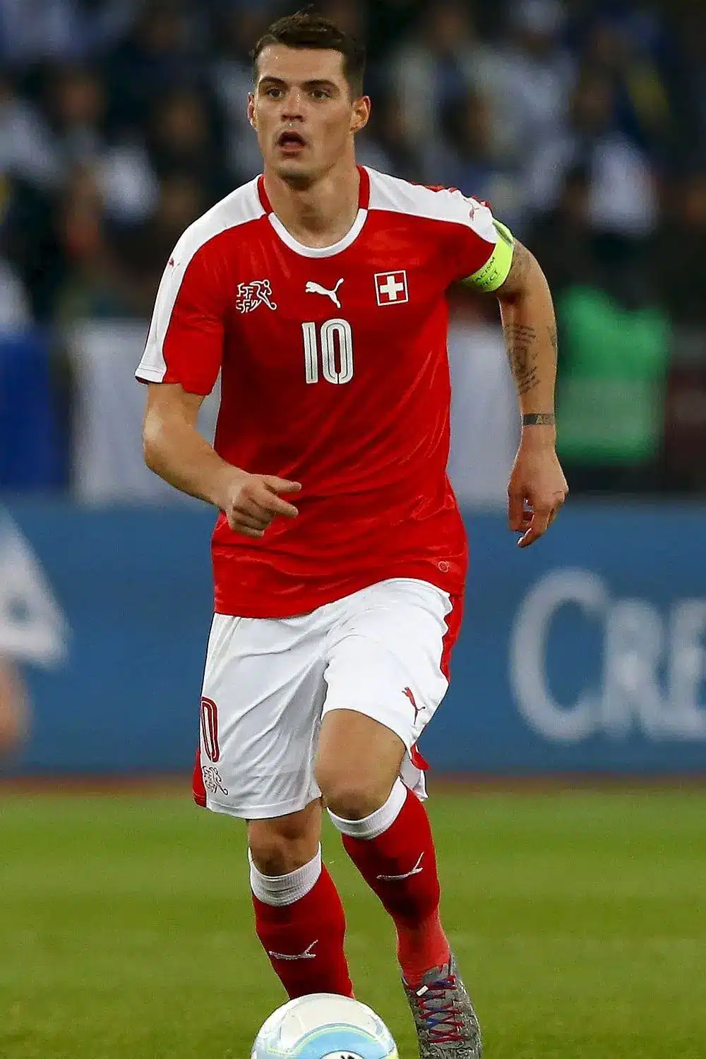 Granit Xhaka wearing Switzerland jersey number 10 during a soccer match.