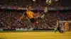 Soccer striker performing bicycle kick during World Cup knockout match in packed stadium