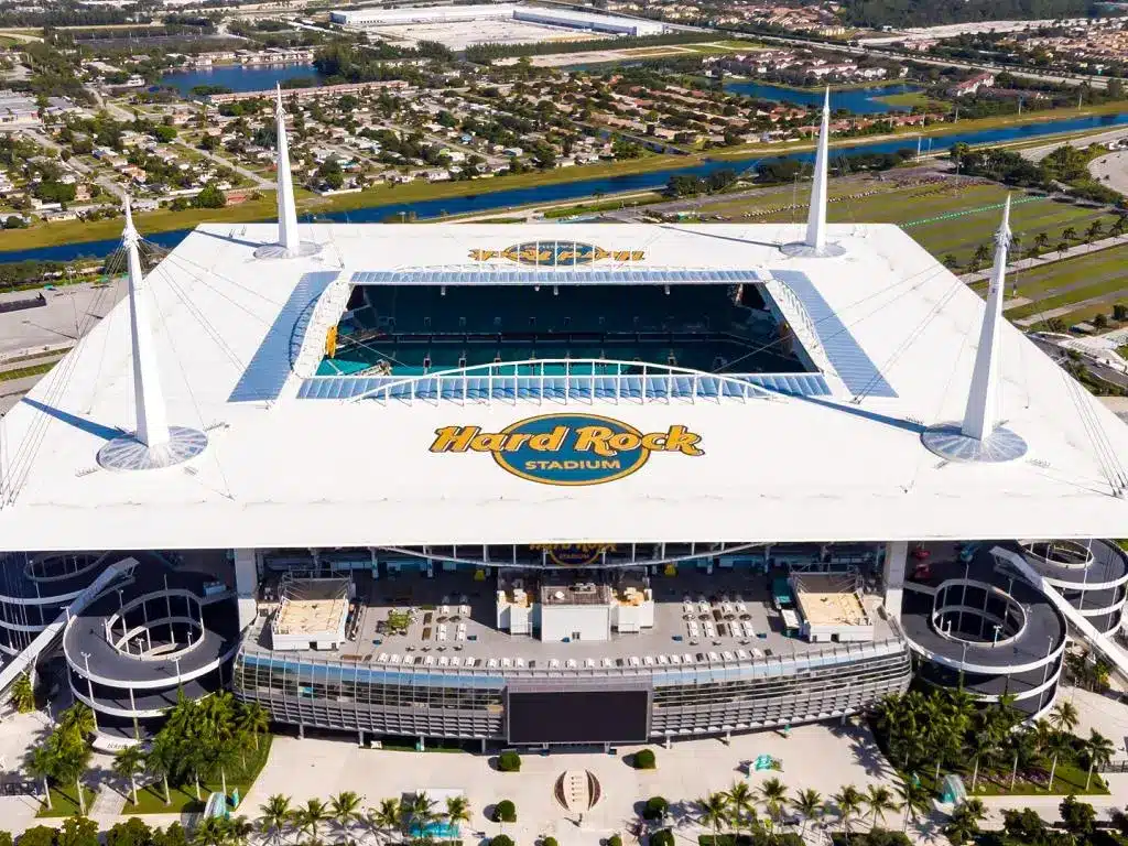 Aerial view of Hard Rock Stadium in Miami, showcasing its architecture and logo.