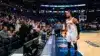 Jalen Brunson in Knicks jersey standing courtside after NBA Finals game in tense postgame moment