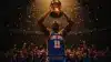 Jalen Brunson celebrates Knicks 2026 NBA championship victory with trophy at Madison Square Garden