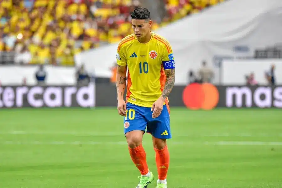 James Rodriguez wearing Colombia national team jersey during a match.