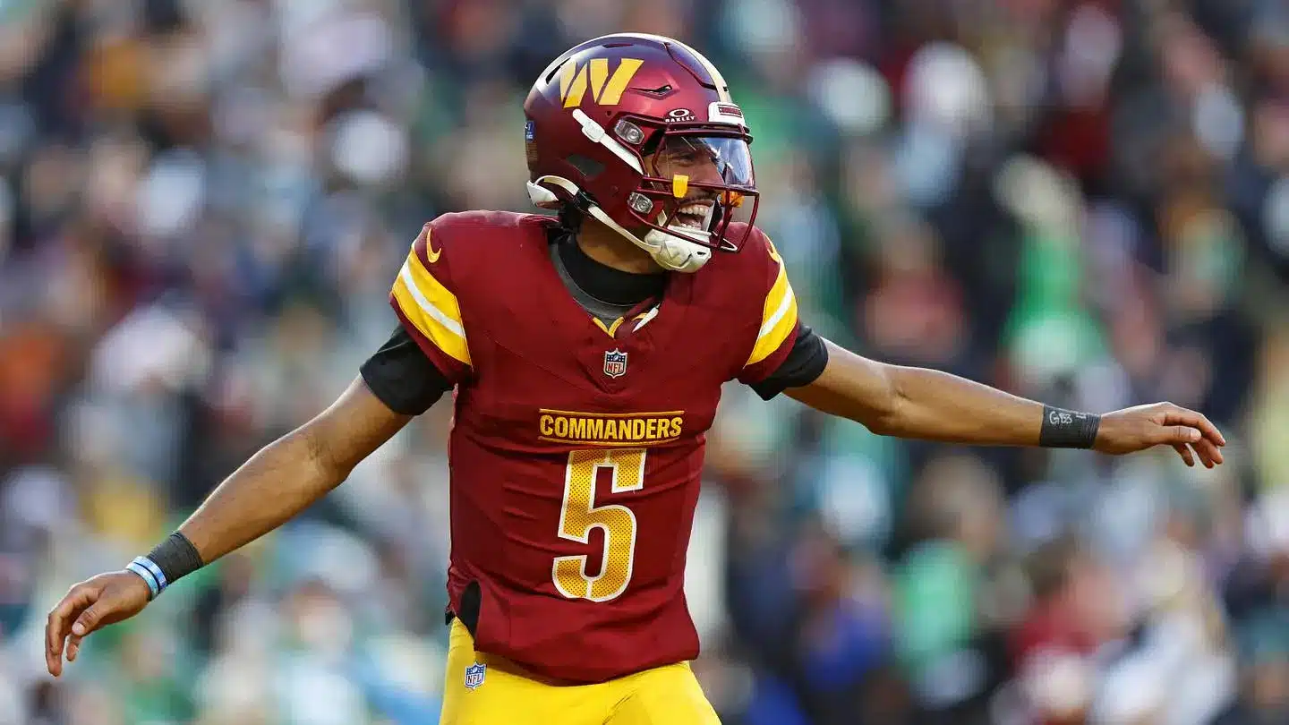 Jayden Daniels in a Washington Commanders uniform during a game.