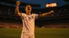 Germany striker celebrating goal during World Cup knockout match at stadium