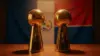 Two NBA championship trophies with Dominican Republic flag symbolizing Towns and Horford's shared legacy