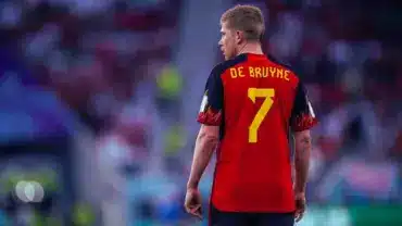 Bruno Fernandes in a Portugal football jersey celebrating during a match.