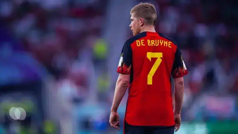 Bruno Fernandes in a Portugal football jersey celebrating during a match.