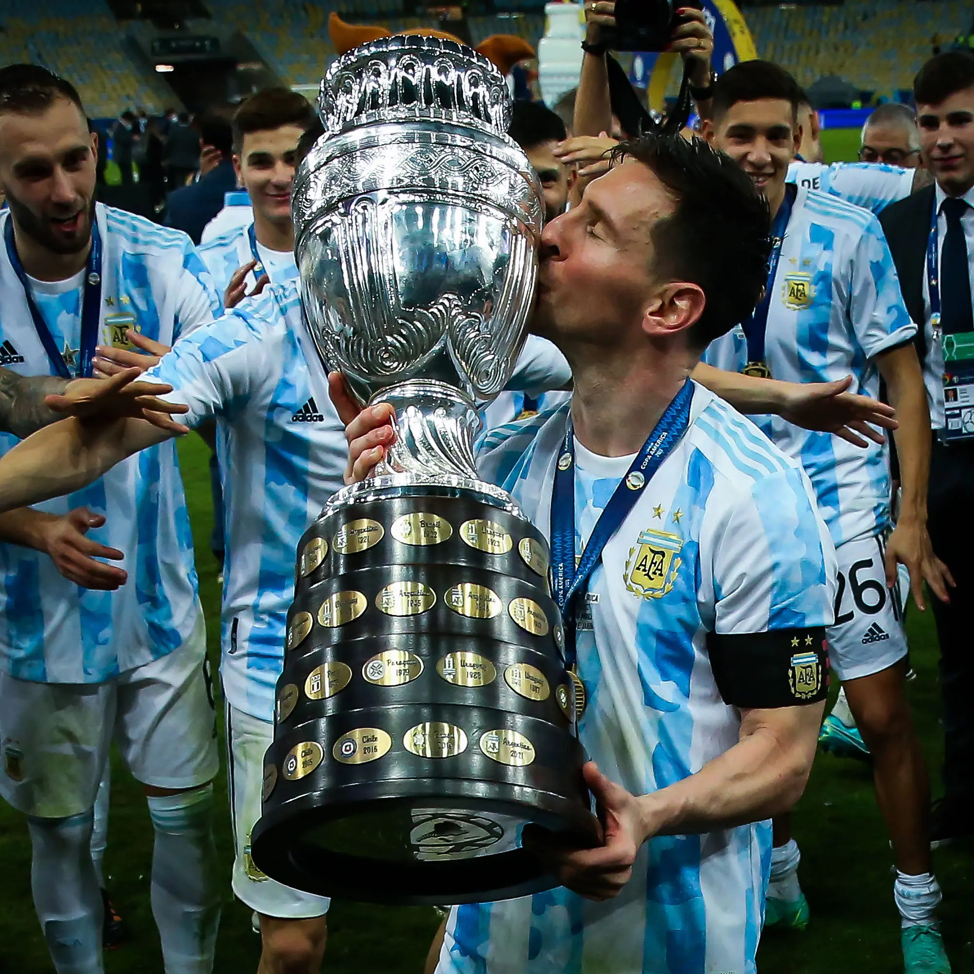 Lionel Messi celebrating with Argentina's Copa America trophy