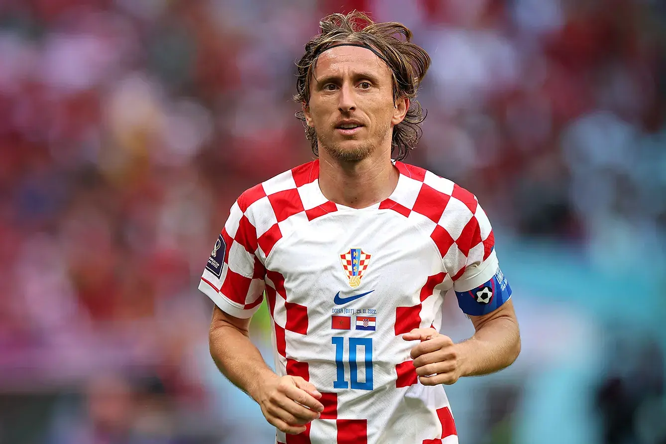 Luka Modric in Croatia national team jersey during a match.