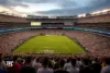 MetLife Stadium soccer field during a match with a crowded audience.