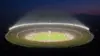 Estadio Azteca illuminated at night during World Cup match with packed crowd and mountain backdrop
