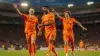 Netherlands national team players in orange jerseys celebrating during World Cup match action