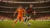 Netherlands vs Morocco World Cup match action in packed stadium under lights