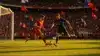 Norway and France players competing for the ball during an intense World Cup 2026 match at a packed stadium