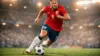 Norwegian football player attacking with ball during intense World Cup qualifying match action