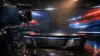 Professional sports broadcasting studio with dramatic lighting and modern television production equipment