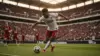 USA striker taking powerful shot on goal at SoFi Stadium during World Cup 2026 match