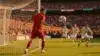 Portugal player shooting on goal against Uzbekistan defenders during FIFA World Cup 2026 Group K match
