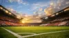 Modern soccer stadium with green pitch and dramatic lighting for World Cup match atmosphere