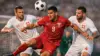 Qatar and Switzerland players competing for the ball during World Cup soccer match