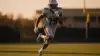 Raiders wide receiver sprinting at full speed during practice showing explosive athleticism