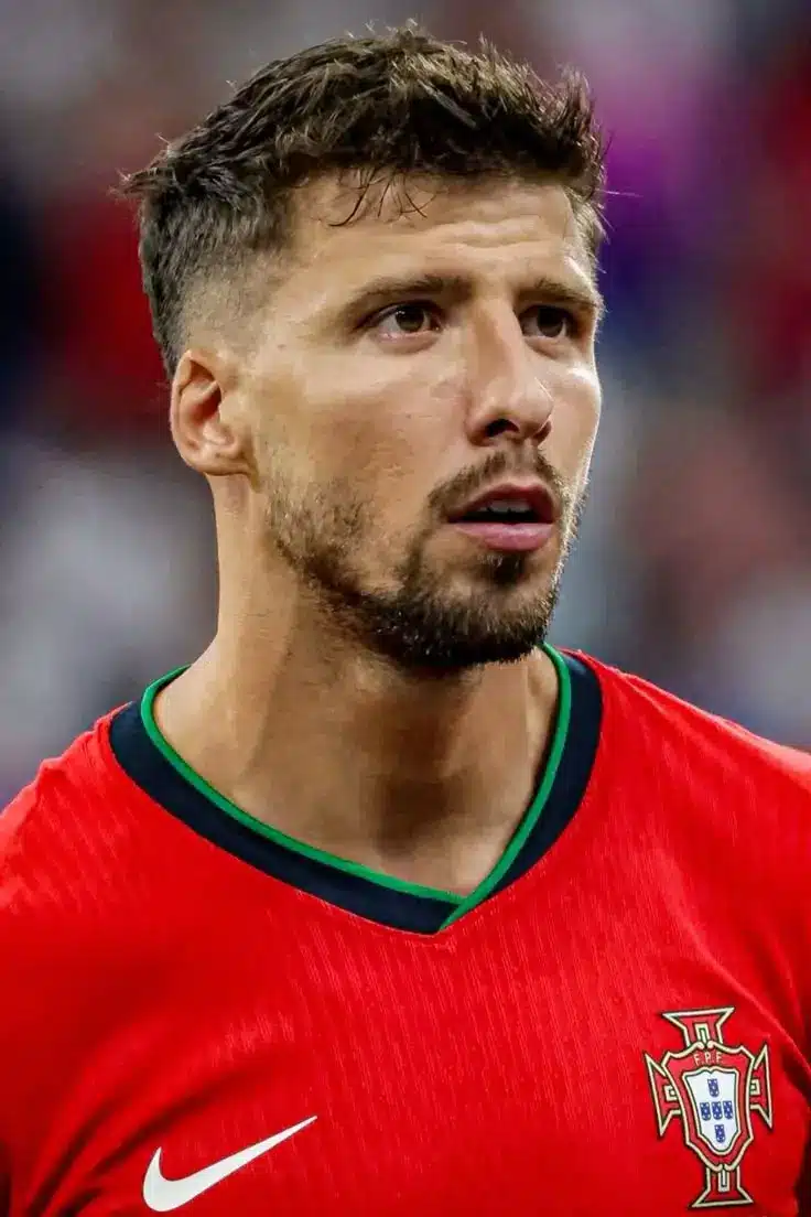 Ruben Dias in Portugal national team jersey during a match.