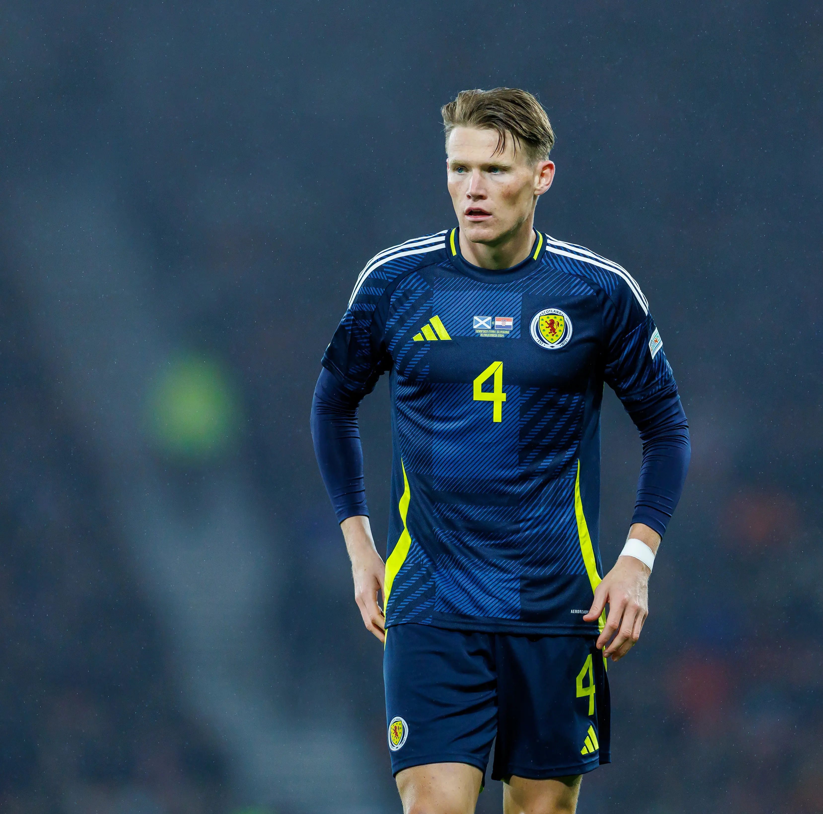 Scott McTominay wearing Scotland national team jersey during a match.