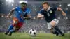 Haiti vs Scotland soccer match action at stadium with players competing for the ball
