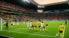 Sweden vs Tunisia World Cup 2026 match action at night stadium with players in yellow and red jerseys