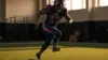 Houston Texans wide receiver training on practice field showing powerful athletic recovery and movement