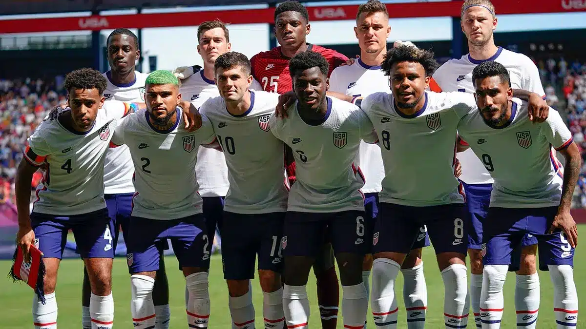 USA men's national soccer team posing for a group photo in uniforms.