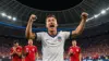 USA soccer players celebrating at SoFi Stadium during World Cup 2026 match against Turkey
