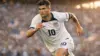 Christian Pulisic sprinting in USMNT jersey during 2026 World Cup match at packed SoFi Stadium