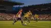 USA vs Australia soccer match action in packed stadium with dramatic evening lighting
