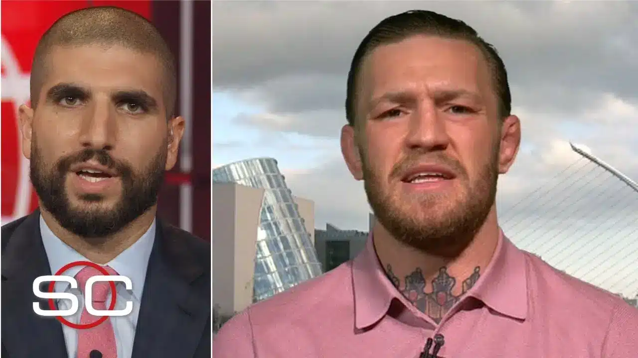 Ariel Helwani and Conor McGregor speaking in a sports interview setting.